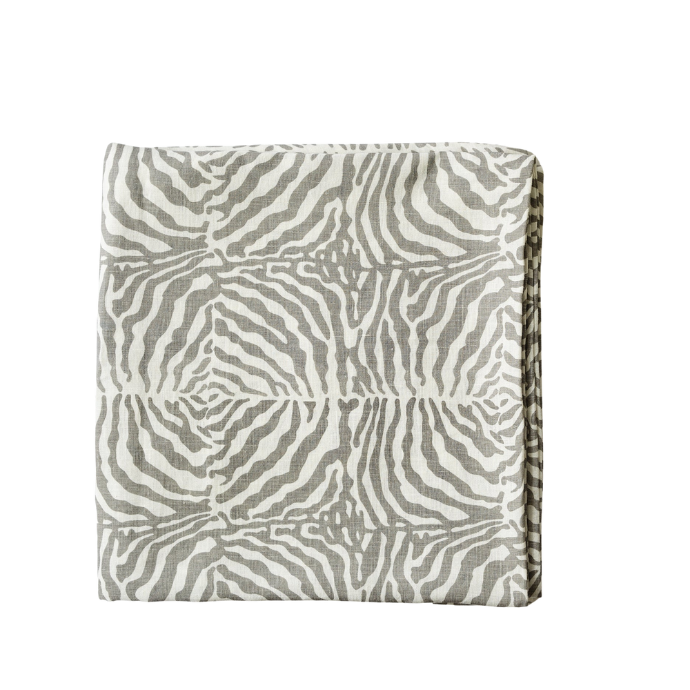 Front view of Zebra Grey Tablecloth showcasing its grey zebra stripe pattern with a plain background