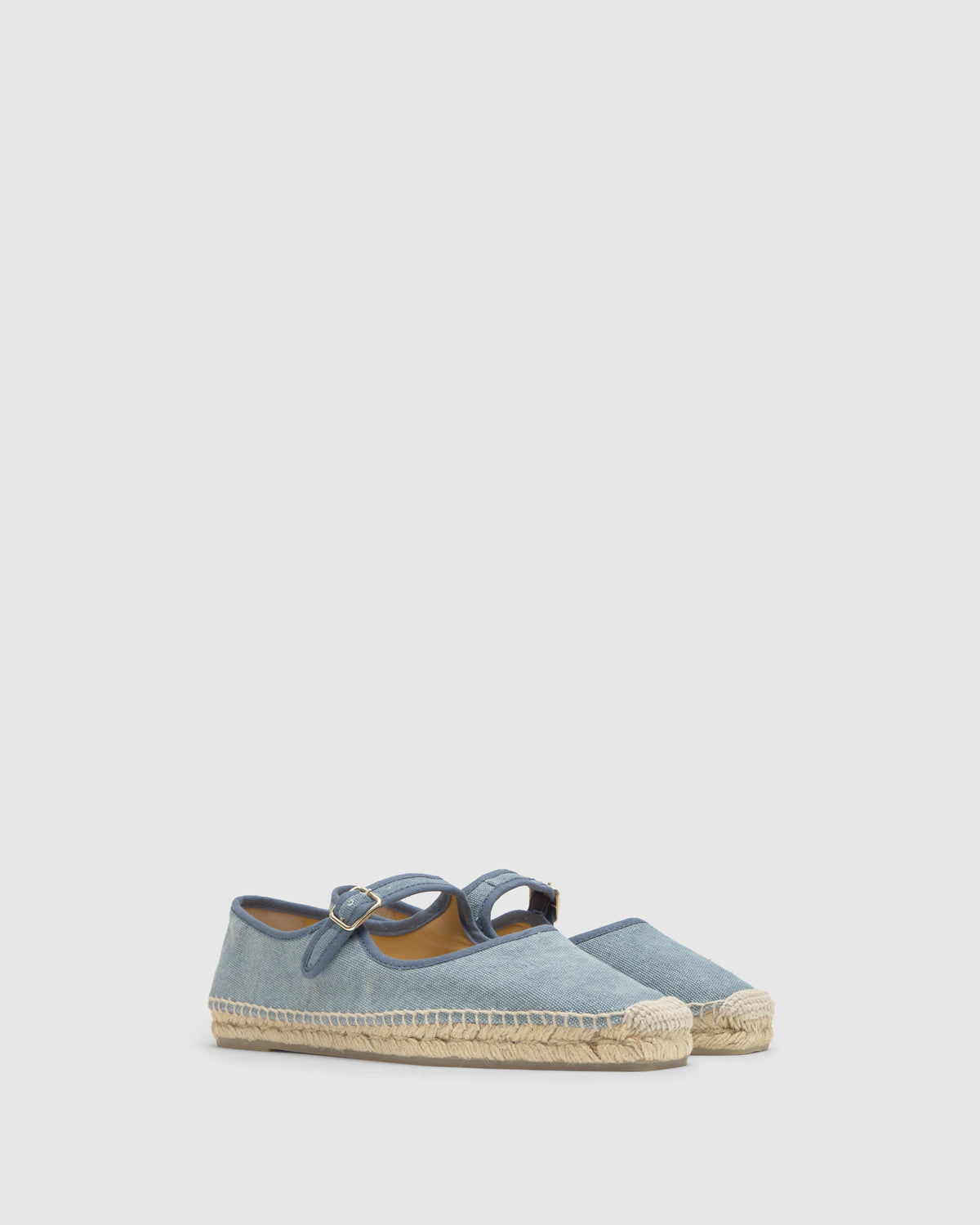 Side view of Padua Mary-Jane espadrille in aqua showing jute-wrapped sole and buckle strap on light gray background