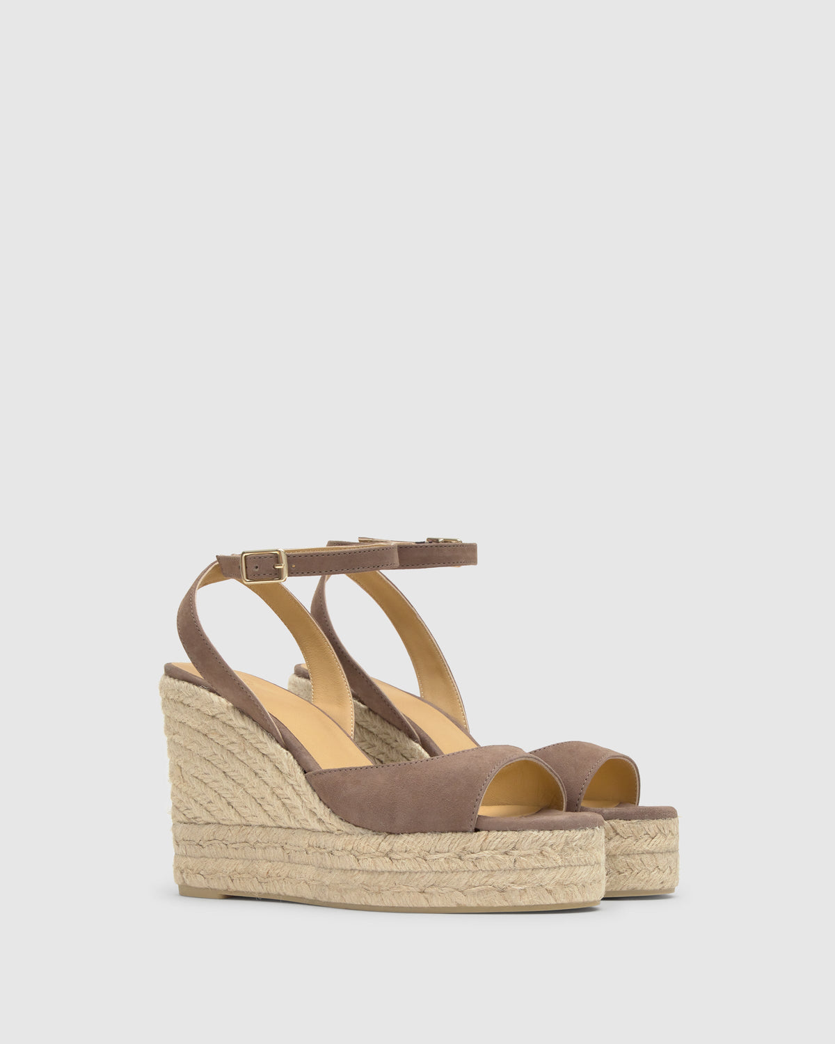 Three-quarter view of Brook 8ED taupe suede wedge sandal with ankle strap and braided jute platform