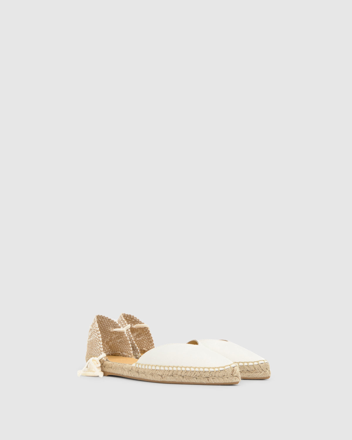 Front view of Brava espadrille in ecru with pointed satin toe, velvet ankle ties, and jute sole