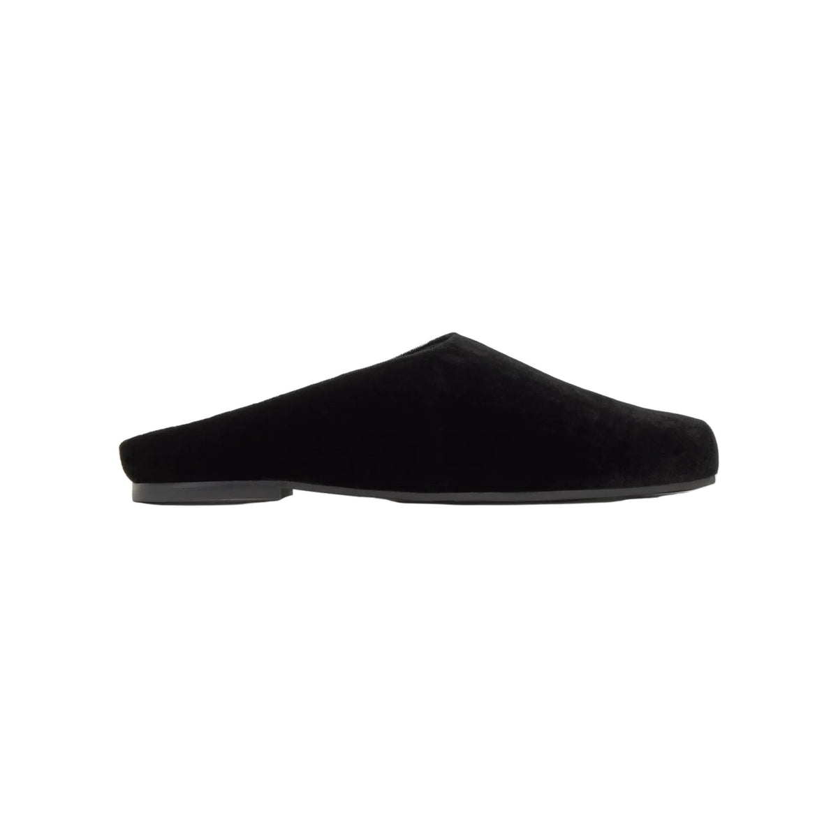 Side view of Gada black velvet slipper showcasing its flat open-back silhouette on a white background