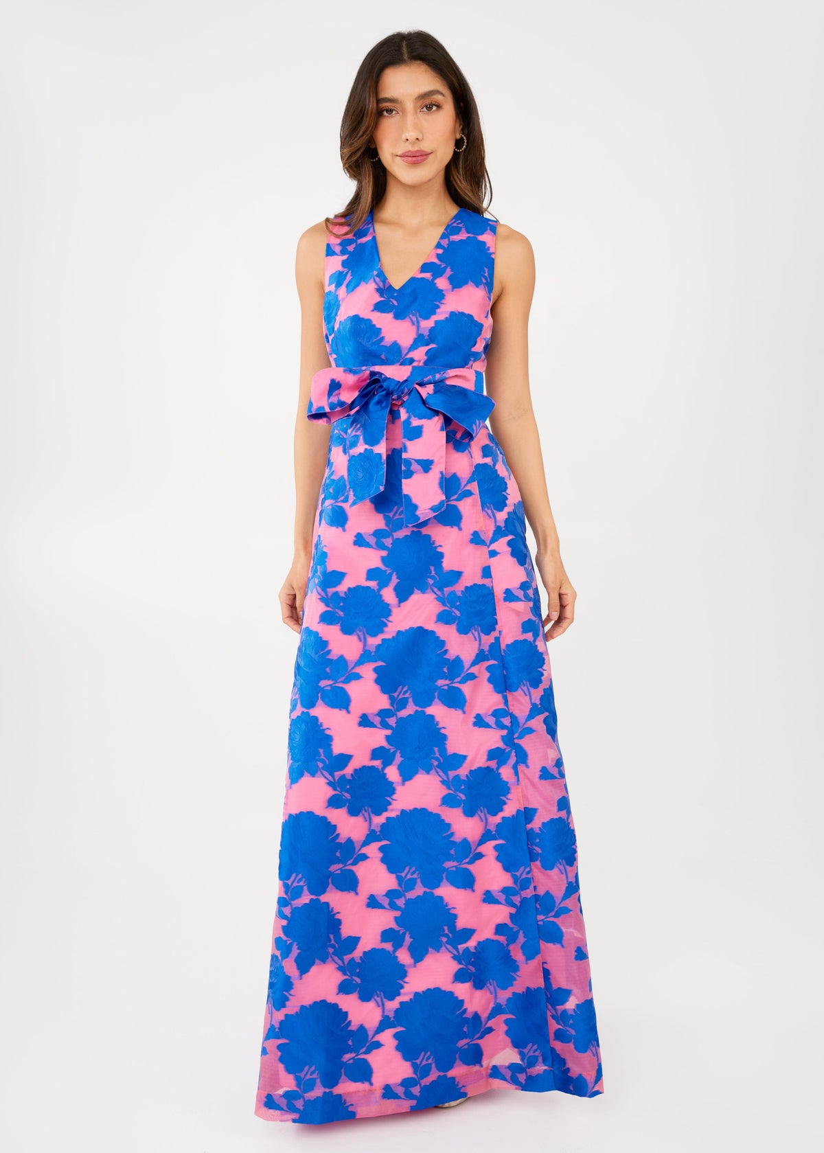 Front view of Arden Gown in Pink and Blue Tea Rose Organza showcasing sleeveless V-neckline and bold florals on white