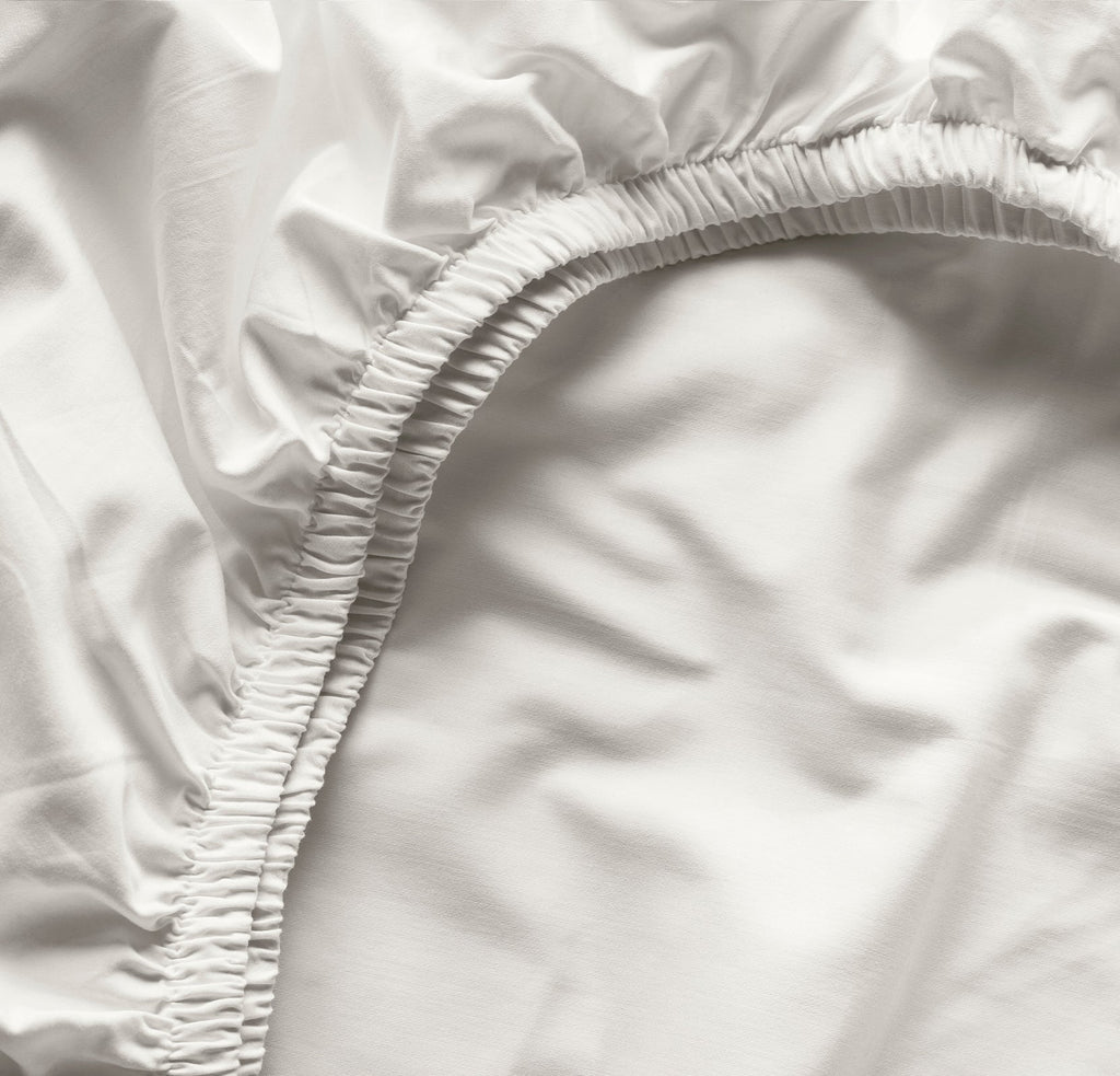 Signature Hemmed Fitted Crib Sheet in White