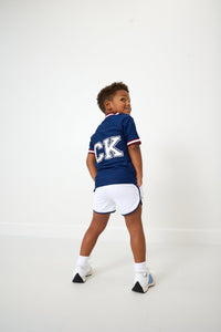 Mesh Super Short in White with Navy Piping