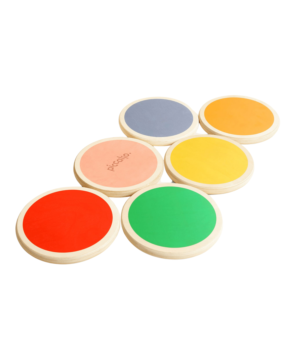 Angled view of Piccalio wooden stepping stones set showing six colorful round stones with non-slip tops on white background