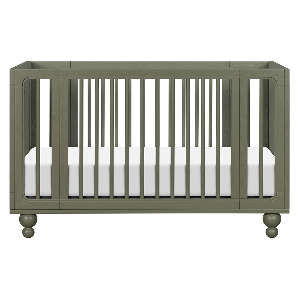 Front view of Astre All-Stages 8-in-1 Crib in Archival Elm showcasing vertical slats and ball feet on white background