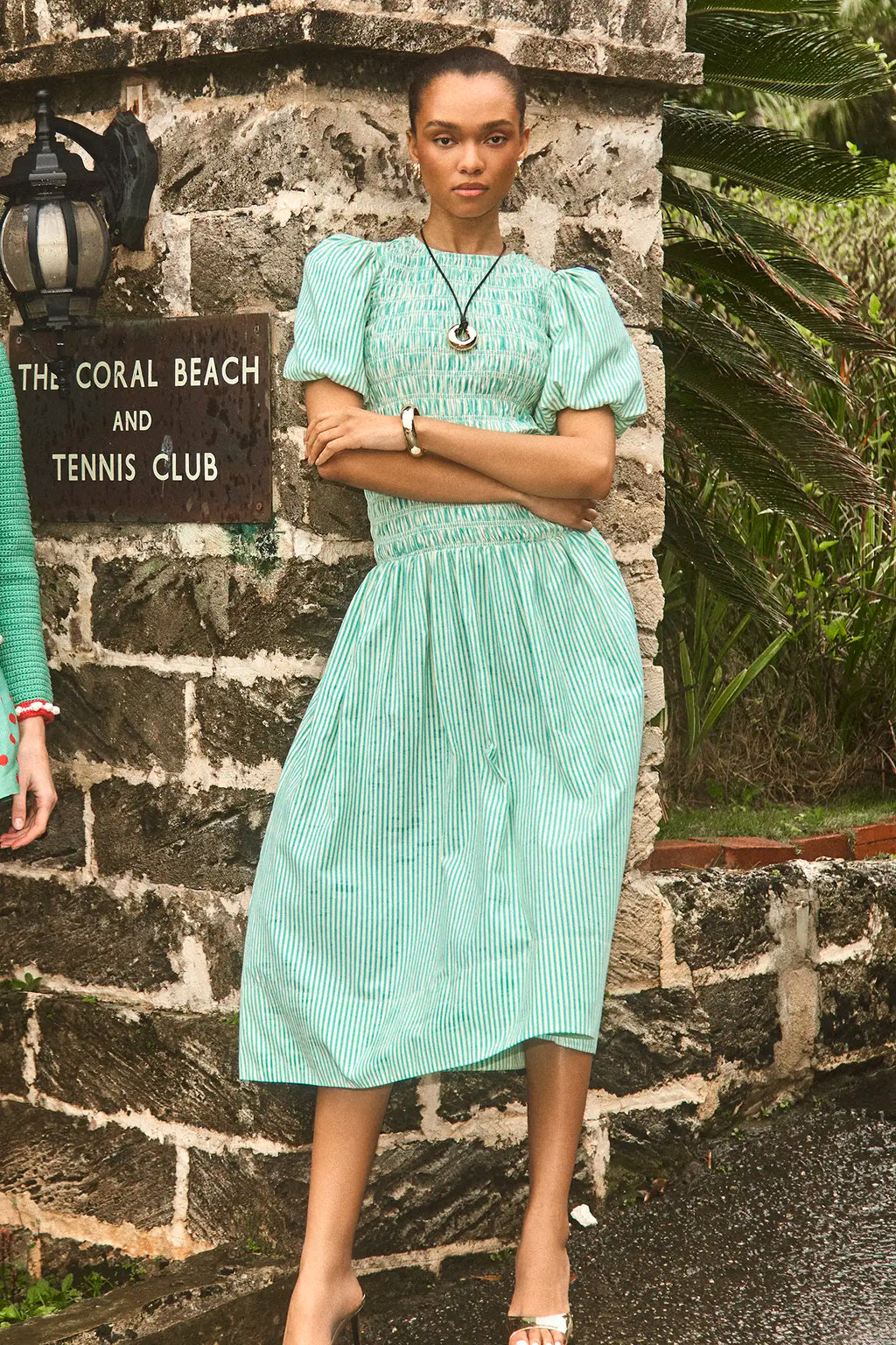 The Scarlet Dress in Saltwater paired with silver shoes.