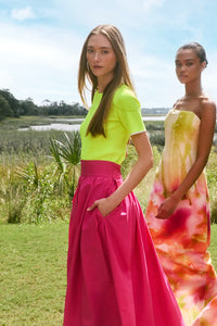 The Avenue Skirt is full-length in stretch taffeta. With a fixed waistband & functional pockets