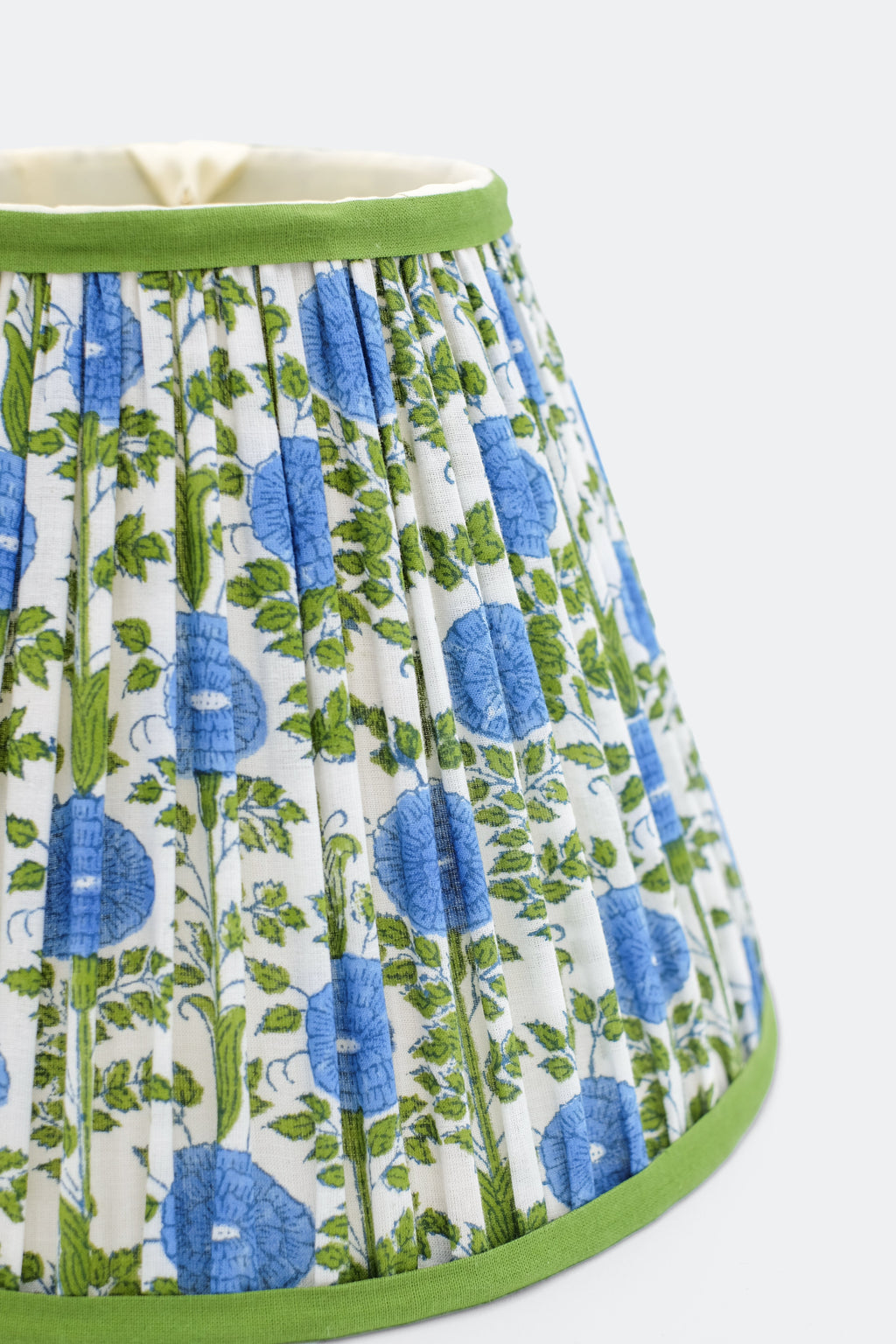 Close-up of 10 inch pleated blockprint empire lampshade showcasing blue floral pattern details from Inner Child