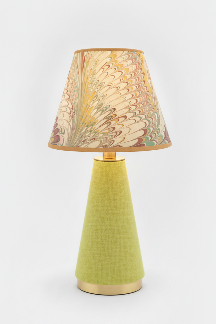 10" hand-marbled empire lampshade with Flatiron Feathers pattern on a green fabric lamp base with gold accents, viewed from a different angle.