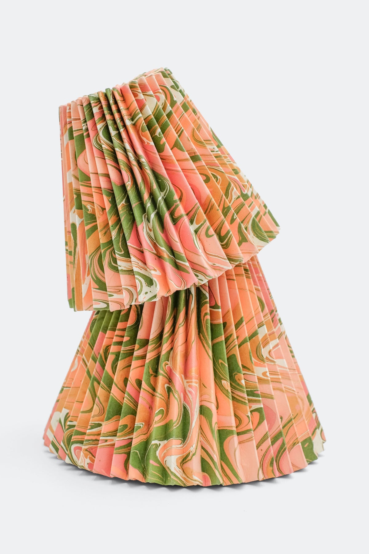 10-inch hand-marbled pleated empire lampshade in Peony Bloom pattern, displaying the flared empire shape with swirling peach, green, and white marbling.