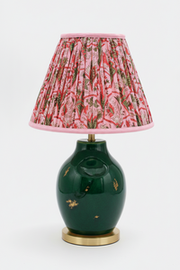 10 inch pleated blockprint empire lampshade attached to dark green ceramic table lamp from Inner Child