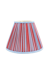 10-inch pleated empire lampshade with Red and Blue Stripes pattern, light blue trim, front view