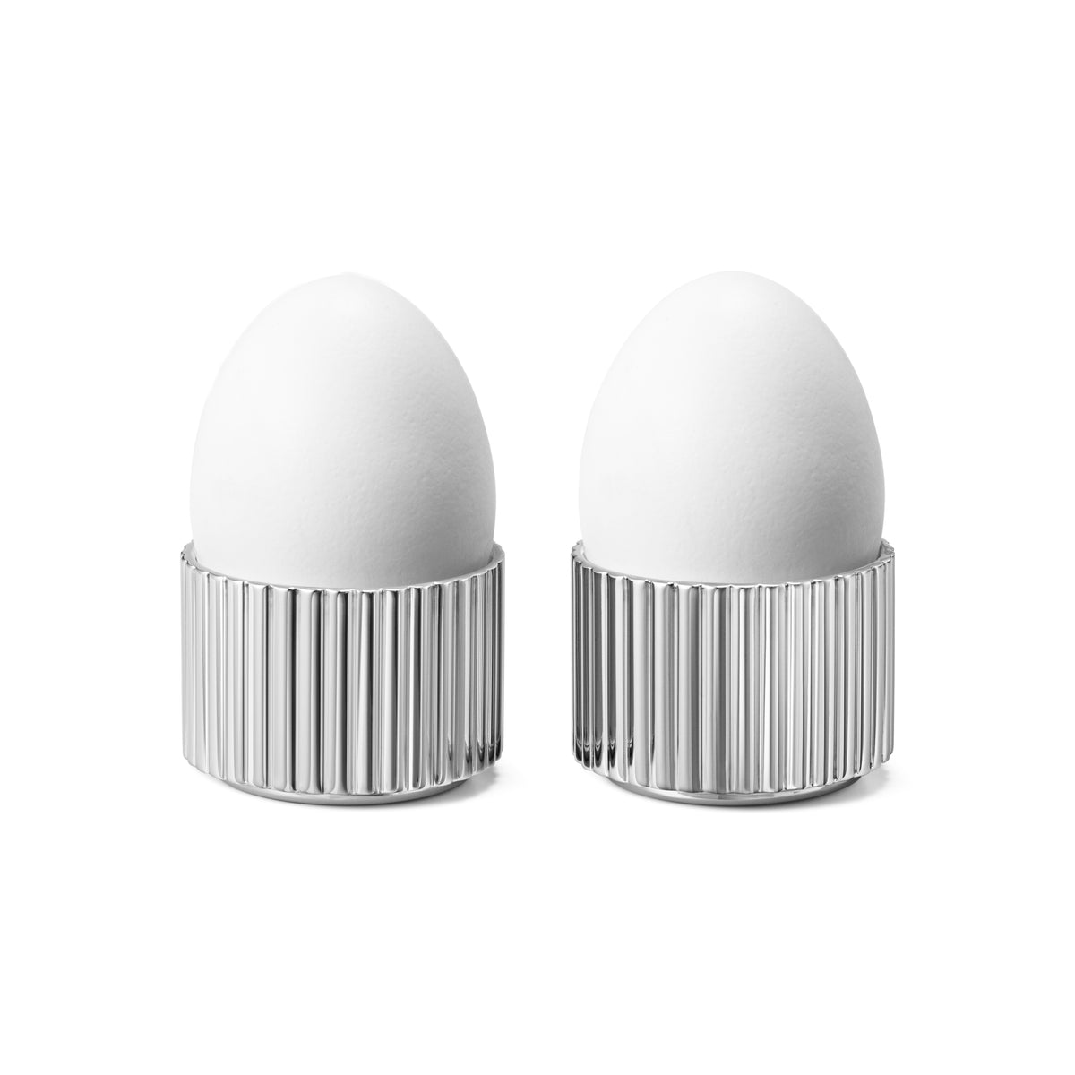 Front view of Bernadotte two piece egg cup set showcasing elegantly ridged matte stainless steel against a white background