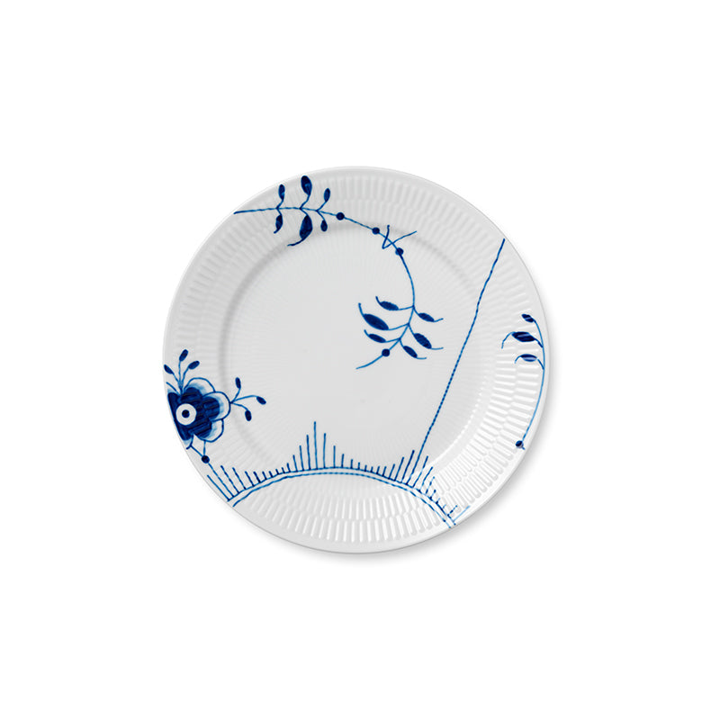 Top view of Blue Fluted Mega dinner plate showcasing blue floral illustrations and fluted rim on a white background