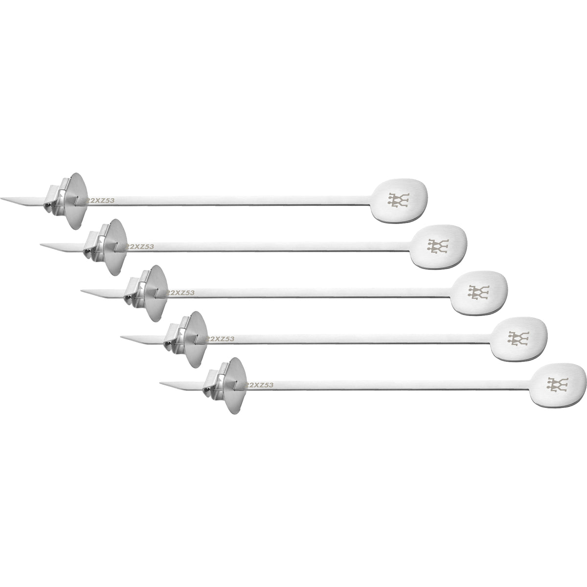 Top view of five stainless steel skewers with sliding circular food guards and flat paddle handles on white background