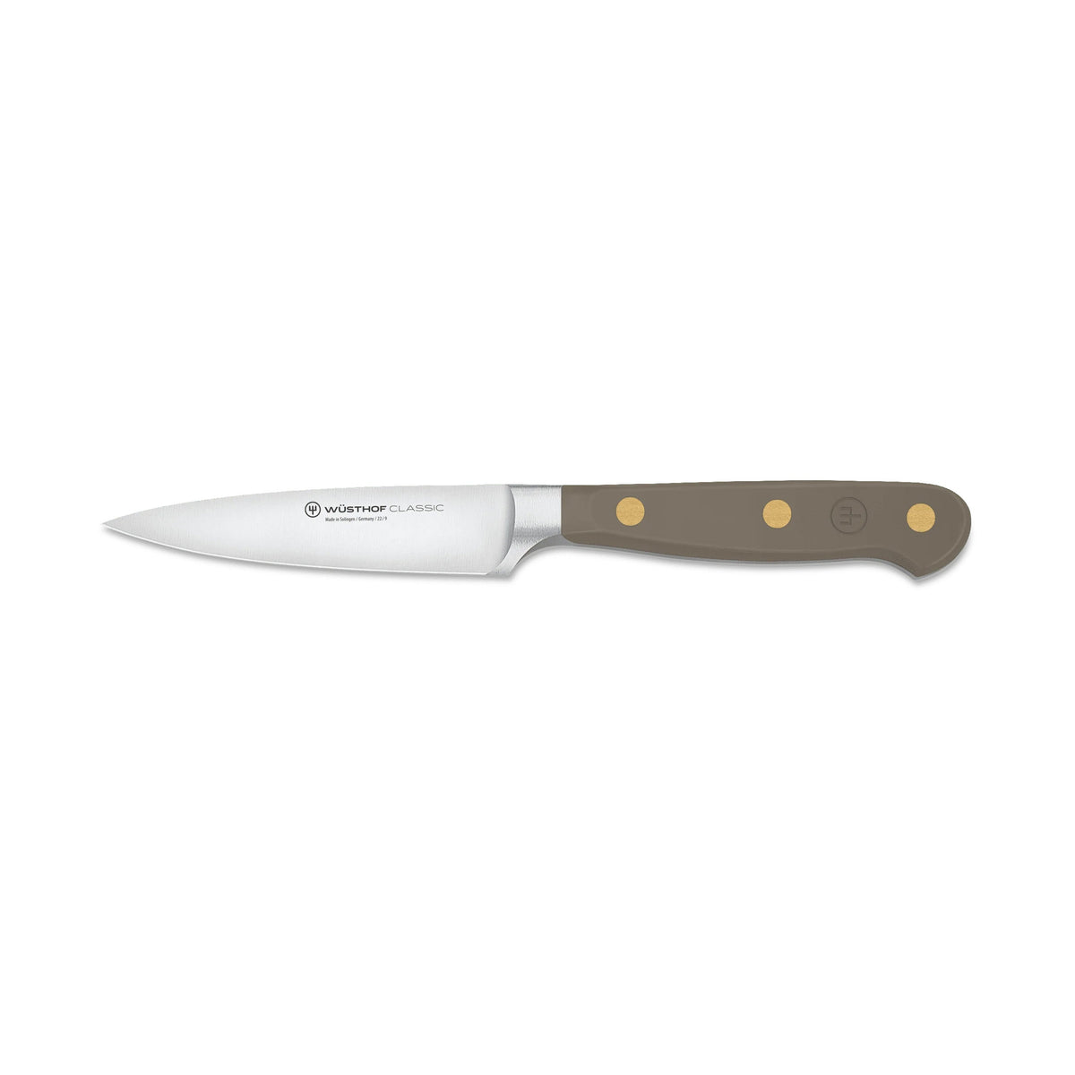 Side view of 3.5 inch paring knife from Wüsthof Classic set showcasing stainless steel blade and Velvet Oyster triple-riveted handle on white background