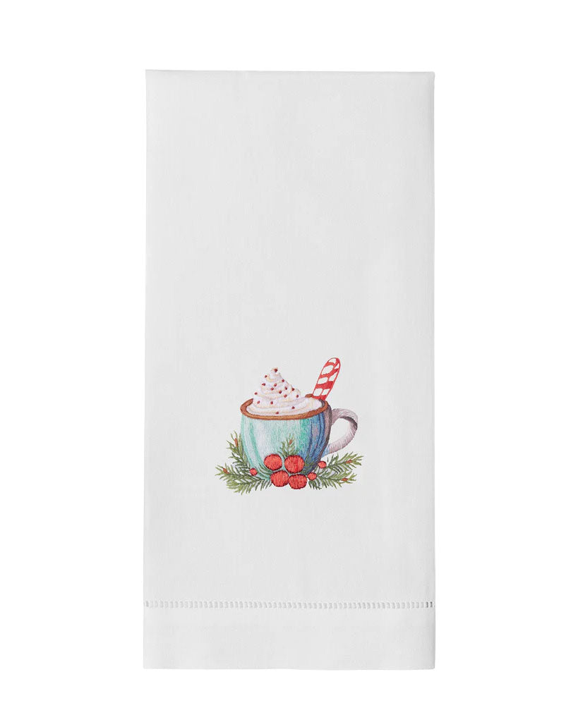 Front of Holiday Hot Chocolate hand towel with hand-embroidered mug, whipped cream, candy cane, and holly on white background