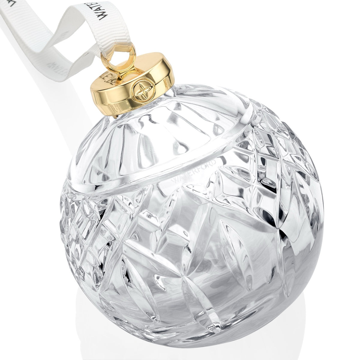 Close-up of Lismore crystal bauble ornament showing diamond and wedge cuts, gold cap and white ribbon