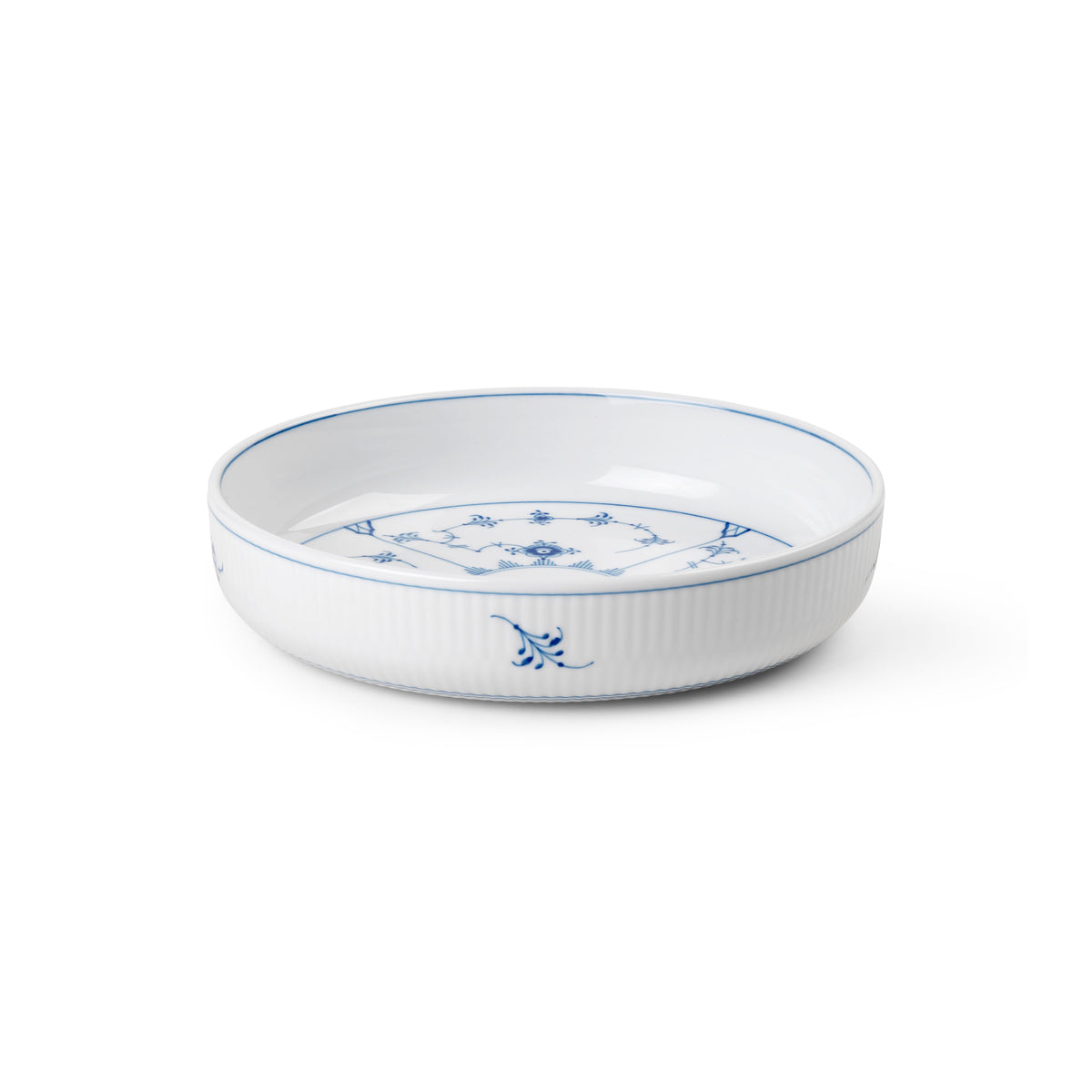 Angled view of Blue Fluted Plain Ovenware Round 7.28 inch showcasing blue fluted porcelain design on white background