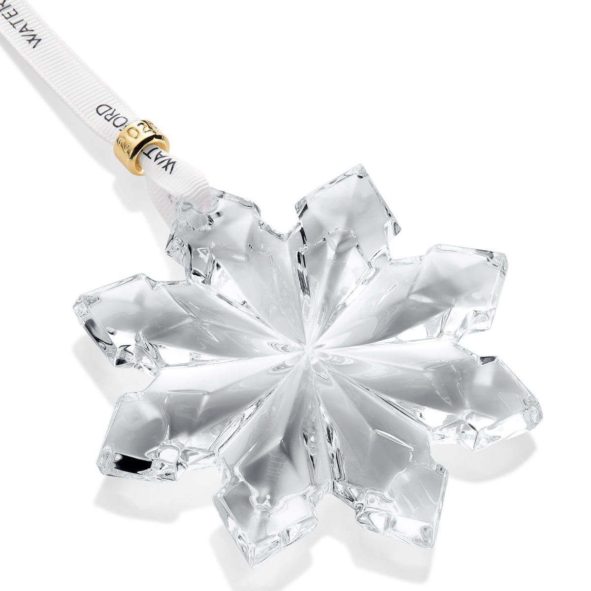 Close-up of Annual Snowcrystal Ornament 2025 showcasing its crystal starburst pattern with a white background