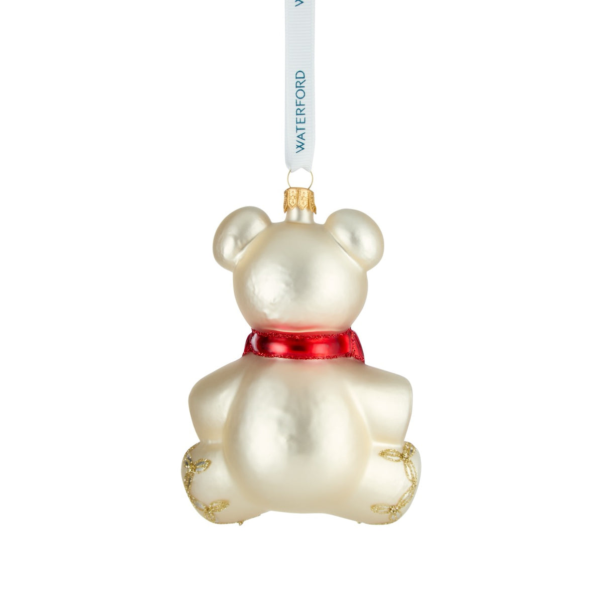 Back view of Holiday Heirlooms First Teddy ornament showcasing red bow and white Waterford ribbon on white background