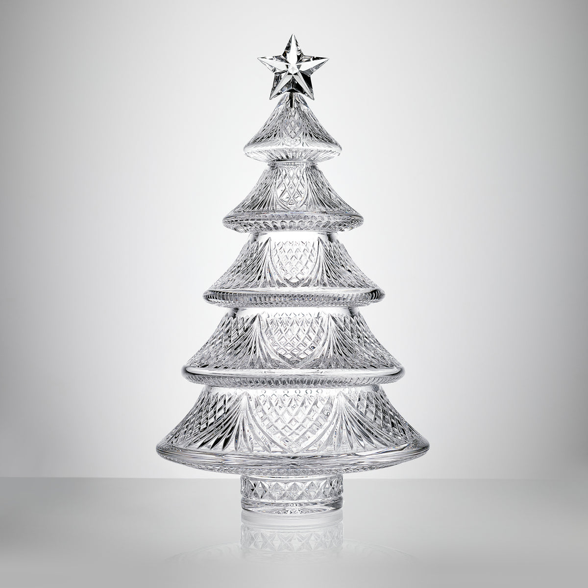 Front view of Sculpted Xmas Tree Large showcasing five tiers, caro patterns, and sculpted star on white background