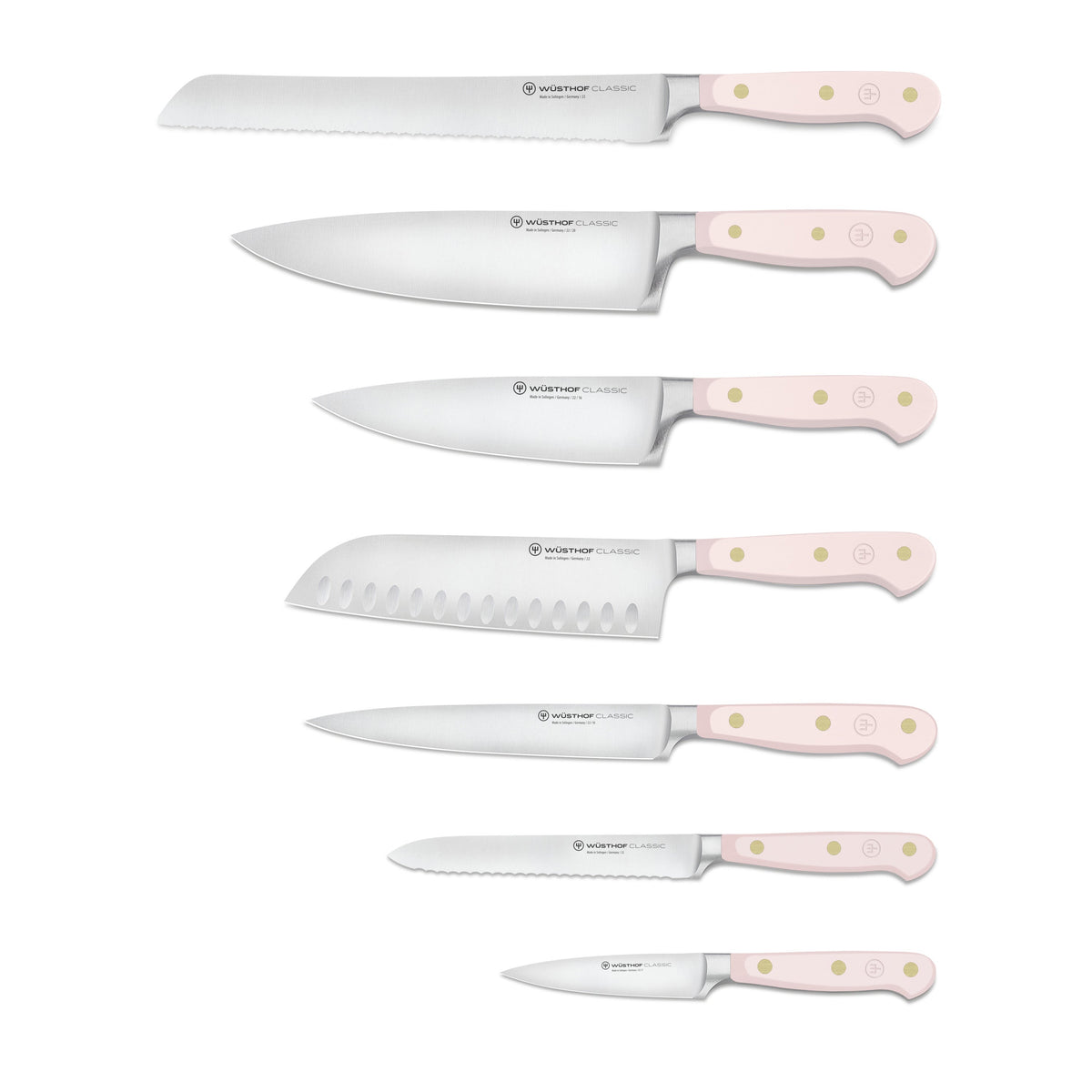 Front view of Classic Designer knife block set in Pink Himalayan Salt showcasing eight pink-handled knives on white