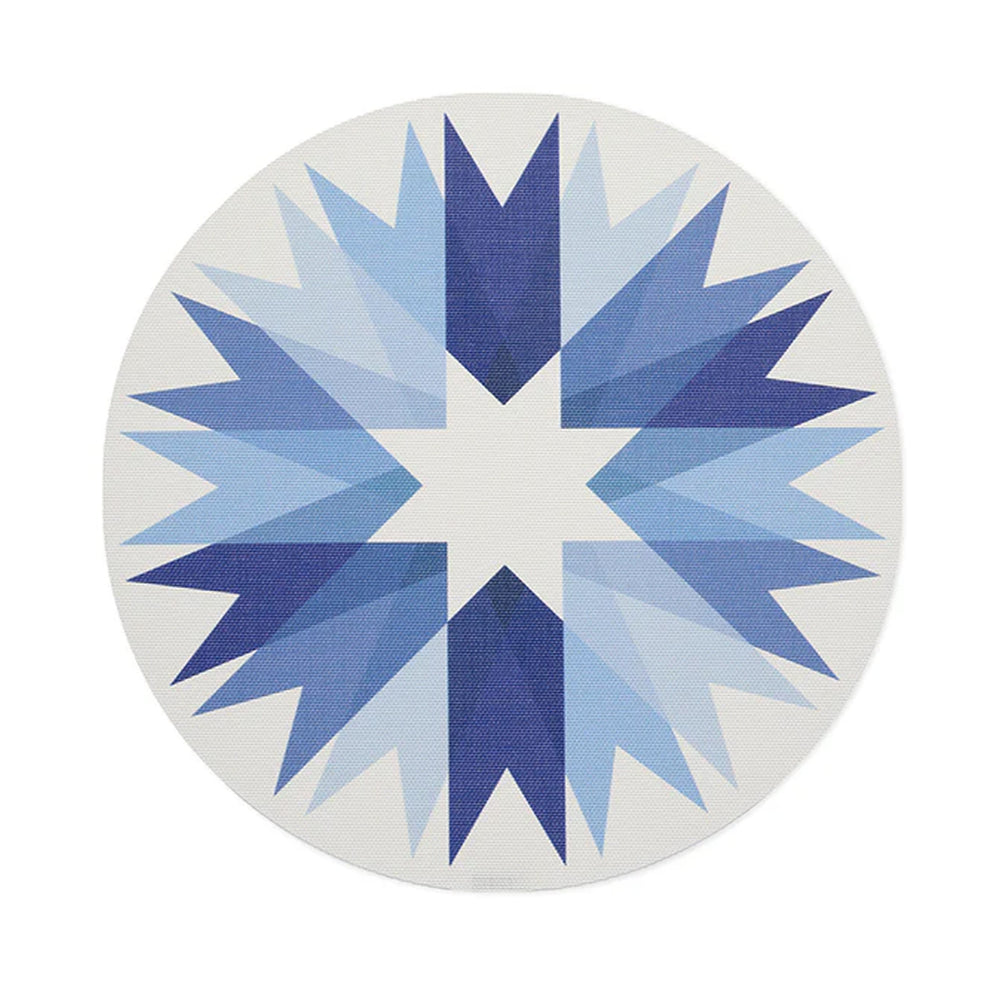 Top view of ribbon placemat showcasing layered blue starburst ribbon pattern on an off-white woven background