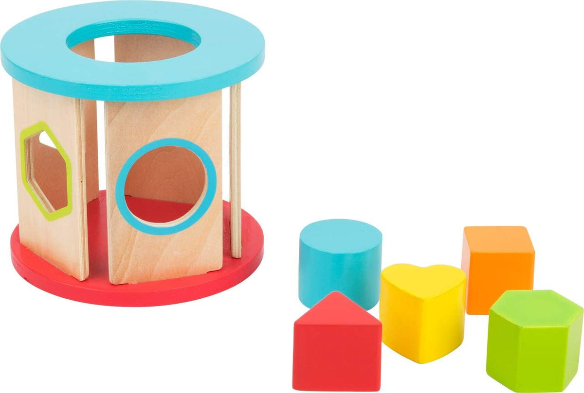 Front view of Motor Skills 3-in-1 Playset showcasing wooden shape sorter with colorful geometric blocks on white background