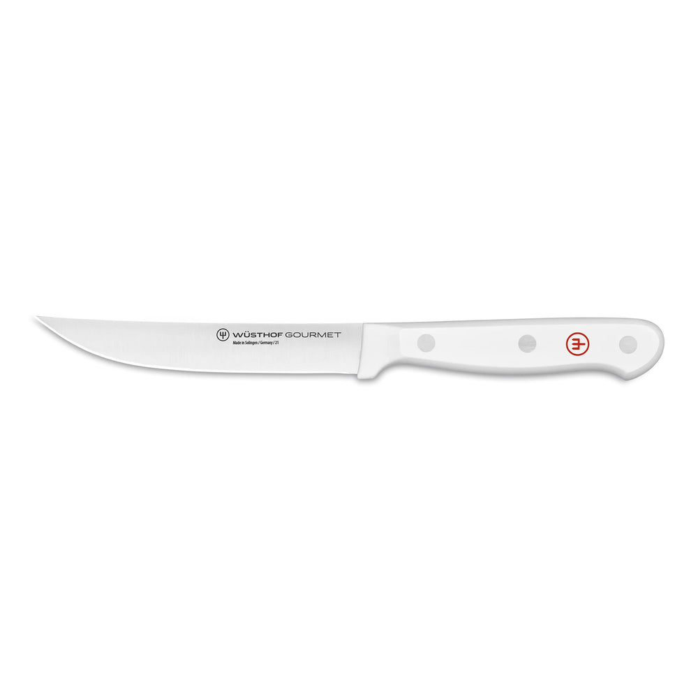 Side view of Wüsthof Gourmet steak knife with white riveted handle, stainless-steel blade, and red logo on white background