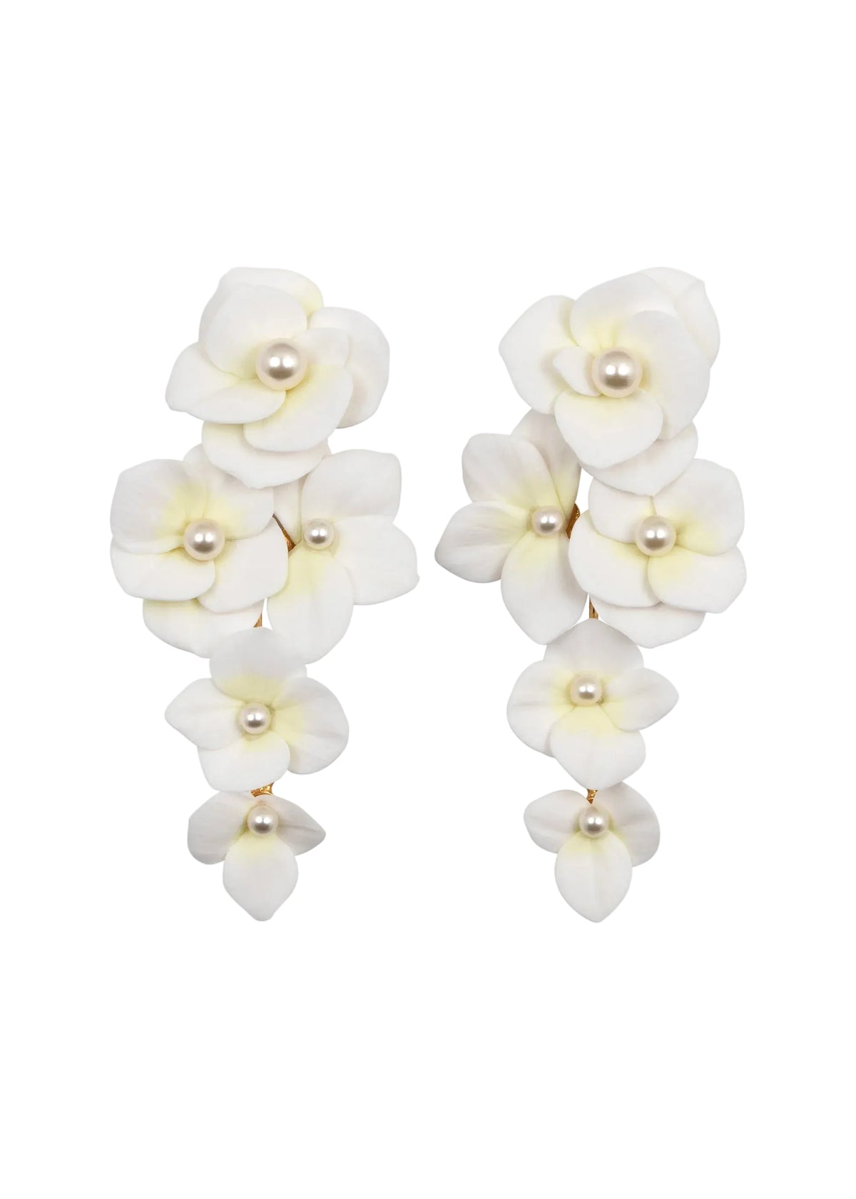 Front of Elowen cream drop earrings showing layered hand-pressed clay petals with crystal pearl centers on white background