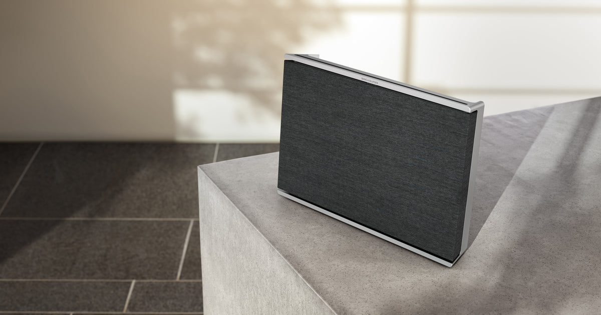 Beosound Level Portable Home Speaker in Natural Aluminum/Dark Gray