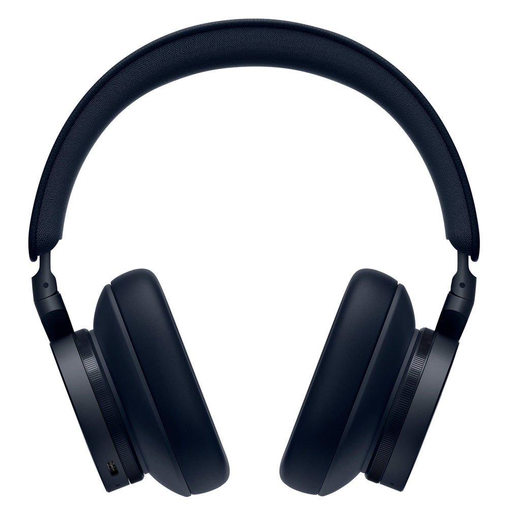 Front view of dark navy over-ear wireless headphones showcasing padded headband and cushioned ear cups on white background