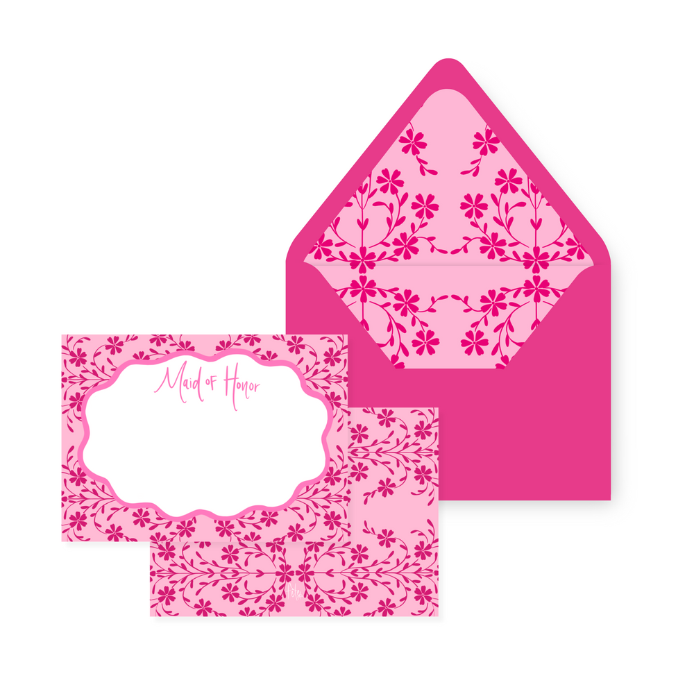 Front of Blushing Botanical Gardens stationery card with ‘Maid of Honor’ name area and matching floral lined hot pink envelope