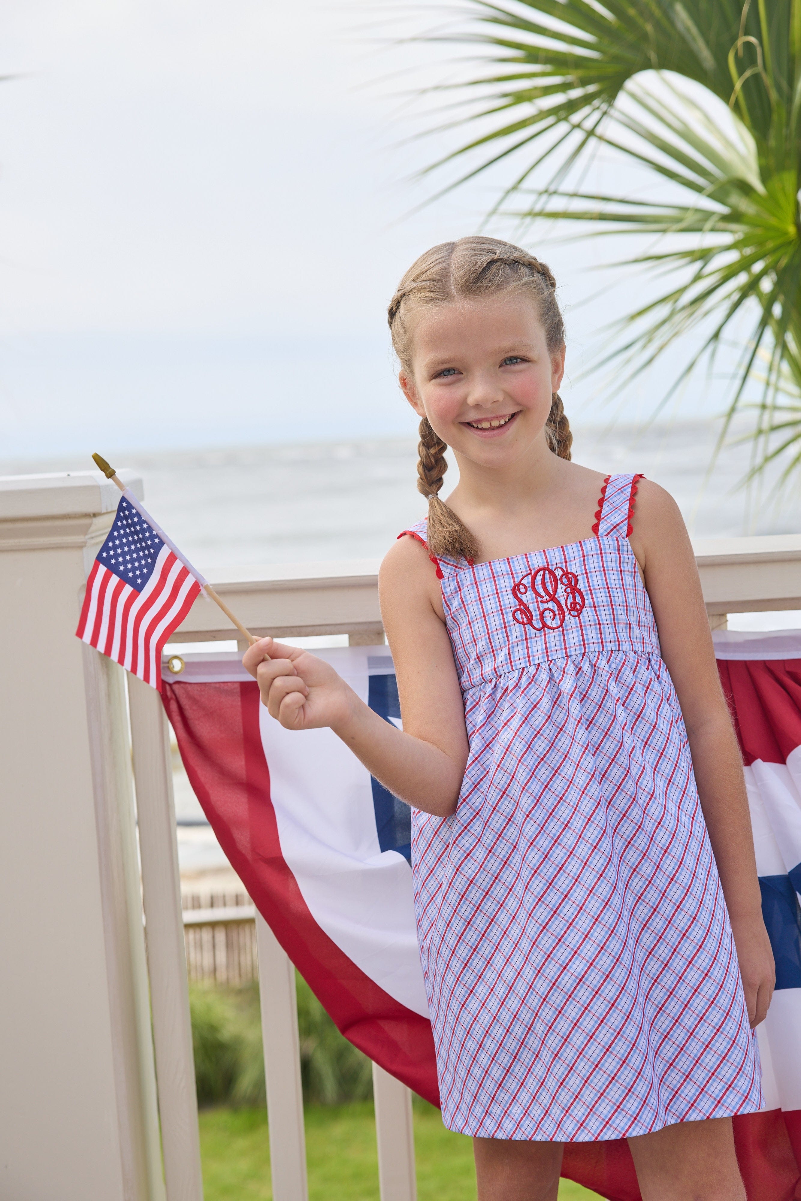 Little English traditional children's clothing.  Patriotic red and blue plaid dress for little girls.  Fourth of July outfit for little girls
