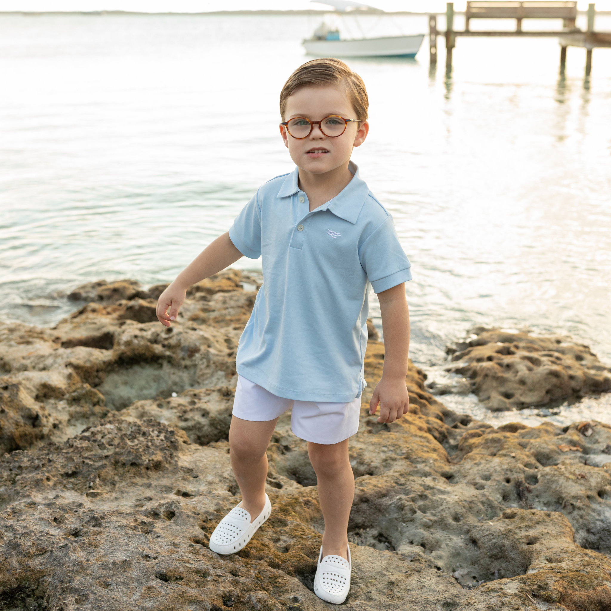 Boys’ white spring dress shorts in crisp cotton with flat front and elastic back waistband, by Henry Duvall – versatile for Easter, portraits, and warm-weather occasions.
