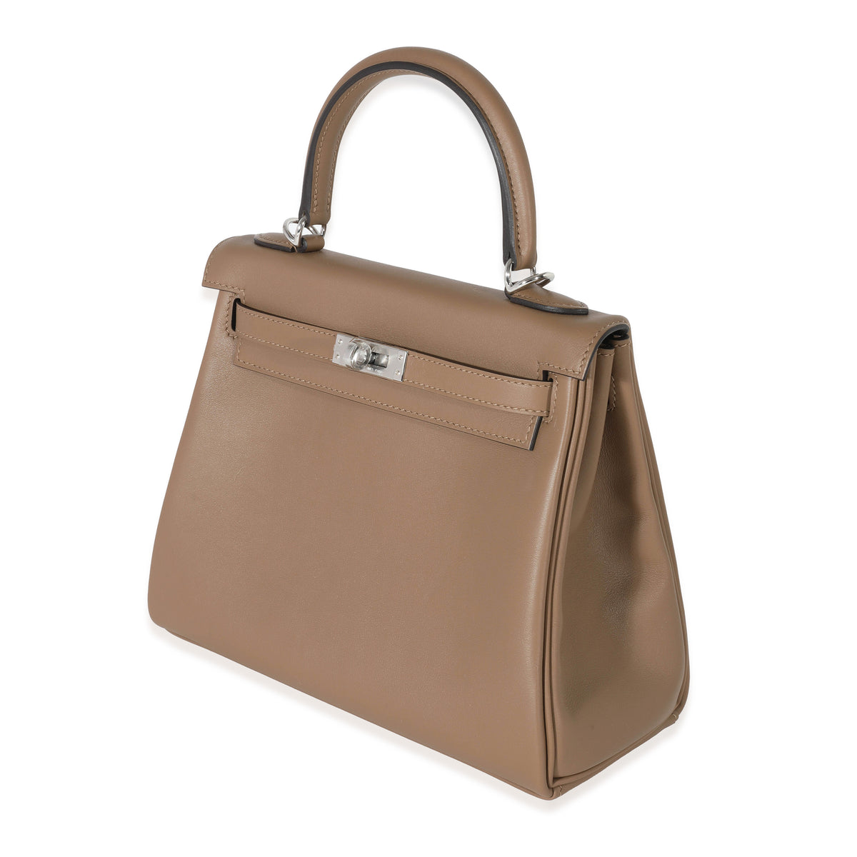 Three-quarter view of Hermes Kelly 25 in Beige de Weimar Swift leather with top handle and palladium hardware on white