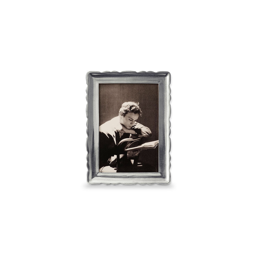 Front view of Medium Carretti rectangle frame showcasing pewter scalloped border and wood backing on white background