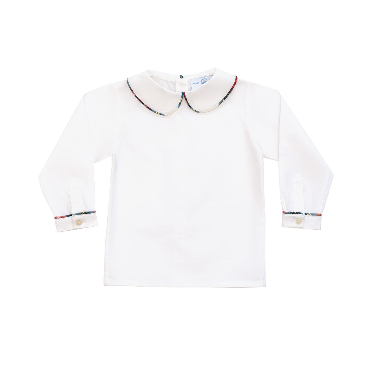 Classic white Peter Pan collar top highlighted with bold Townsend Tartan trim. A signature holiday piece from Henry Duvall’s Holiday Collection.
