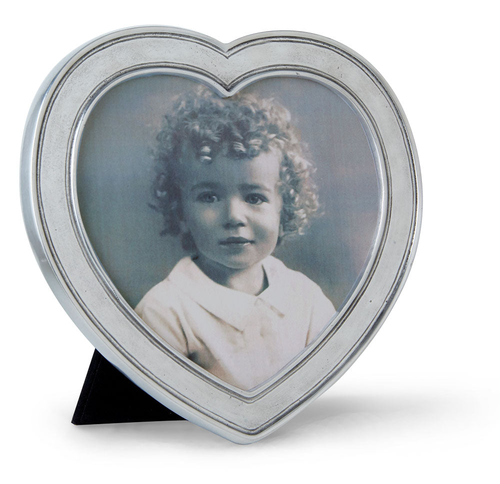 Front view of Heart Frame showing heart-shaped pewter frame with wood backing on white background