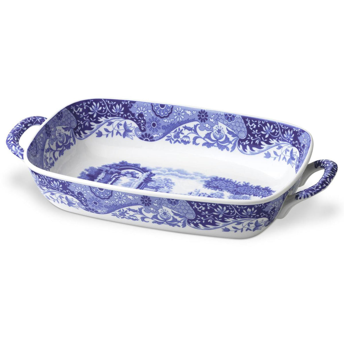 Angled view of Blue Italian Handled Serving Dish showcasing blue and white pattern, curved sides, and two handles