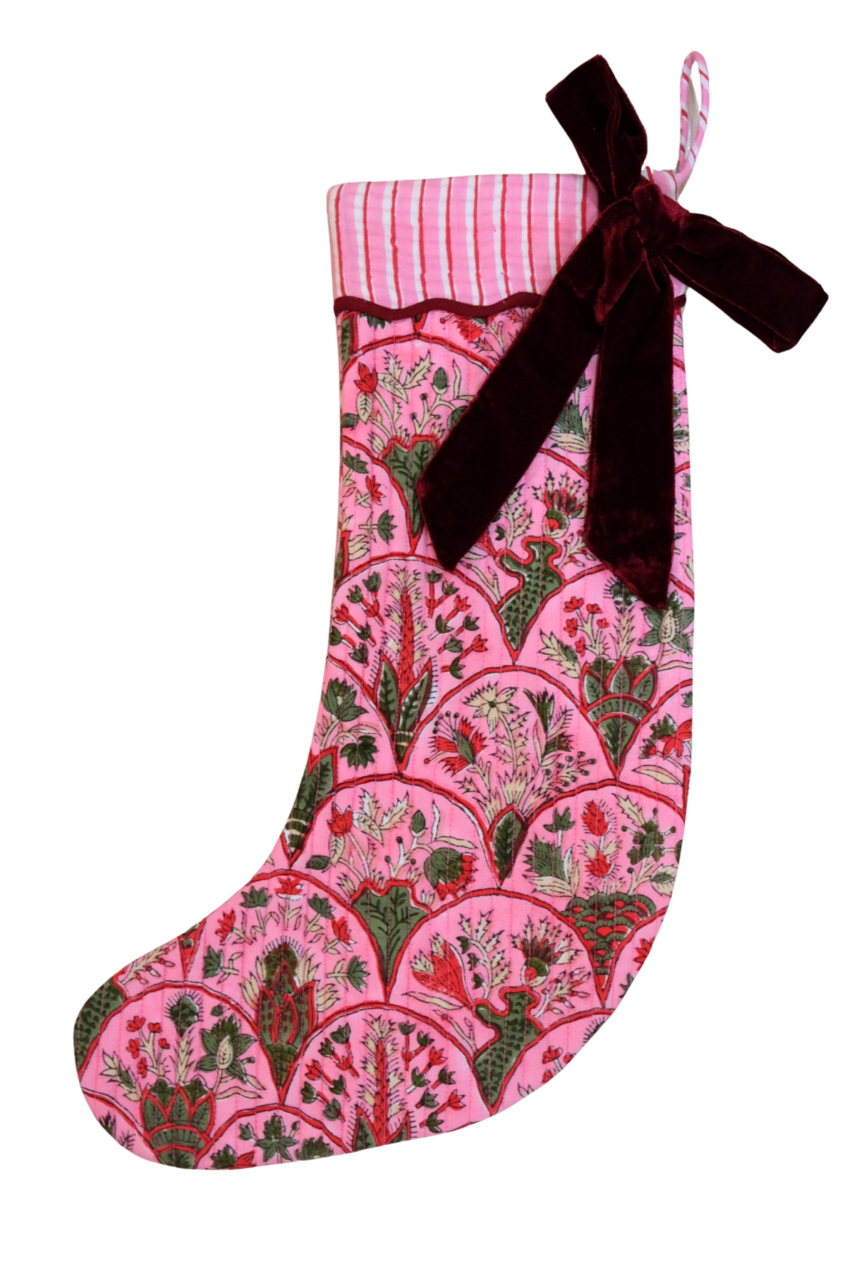 Blockprint holiday arch stocking with pink decorative pattern, dark red velvet bow, pink striped cuff