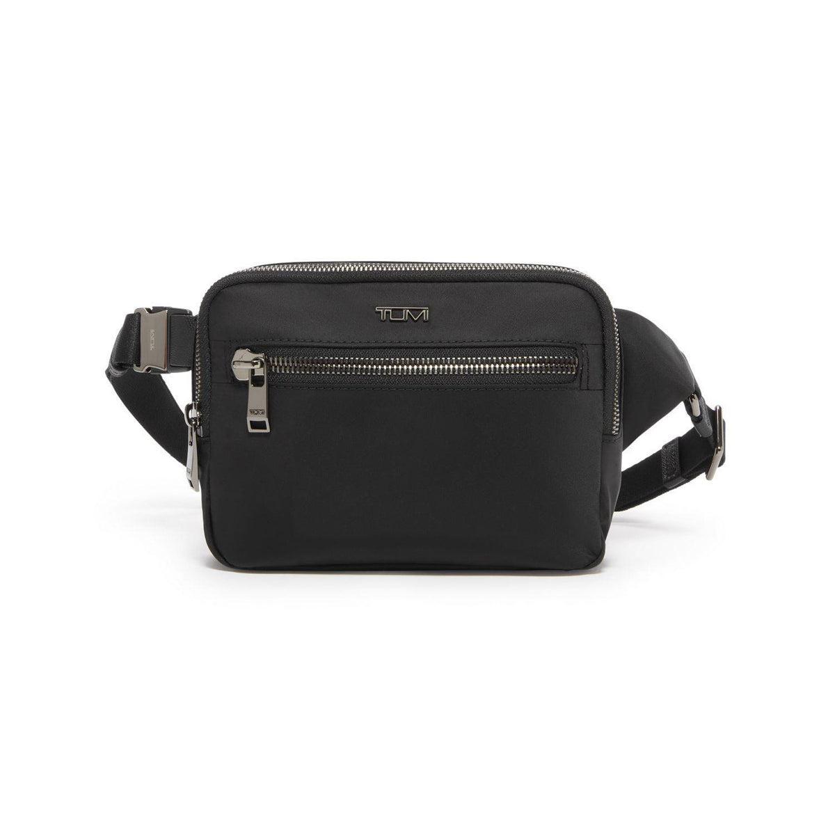 Front view of the Voyageur Sedona Crossbody Sling showcasing a front zip pocket and adjustable strap on a white background