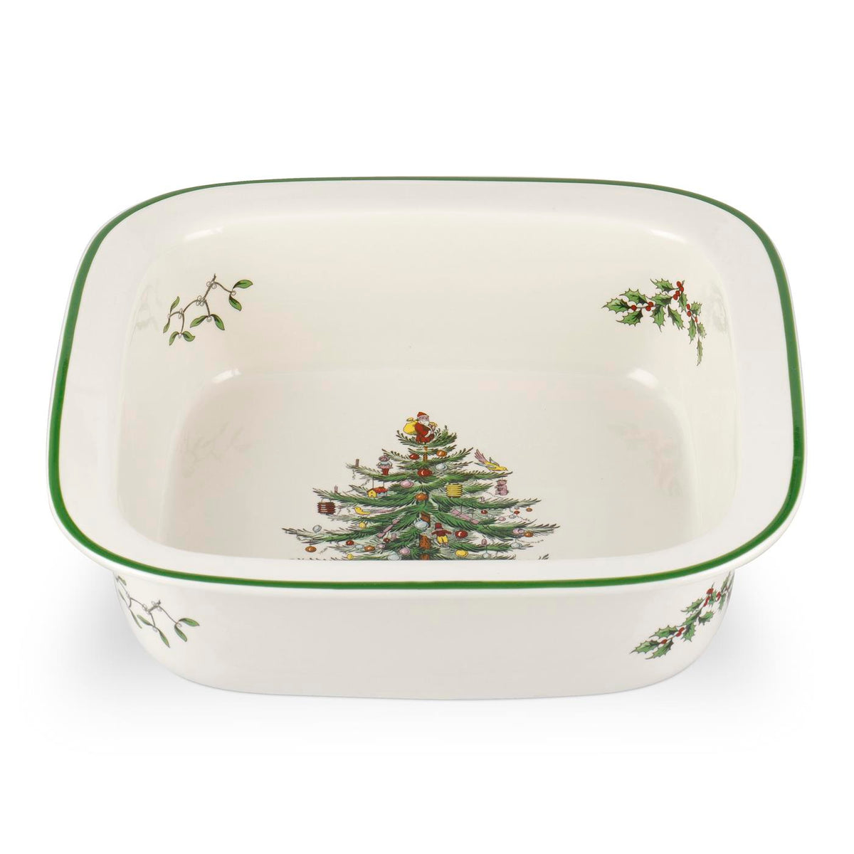 Angled top view of Spode 10-inch square baker showcasing interior Christmas Tree design and green rim on white background