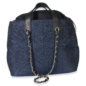 Front view of Chanel Navy Blue Raffia CC Expandable Shopping Tote showcasing blue raffia and silver-tone hardware