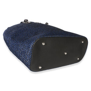 Bottom view of Chanel Navy Blue Raffia CC Expandable Shopping Tote showcasing black base panel and silver-tone hardware