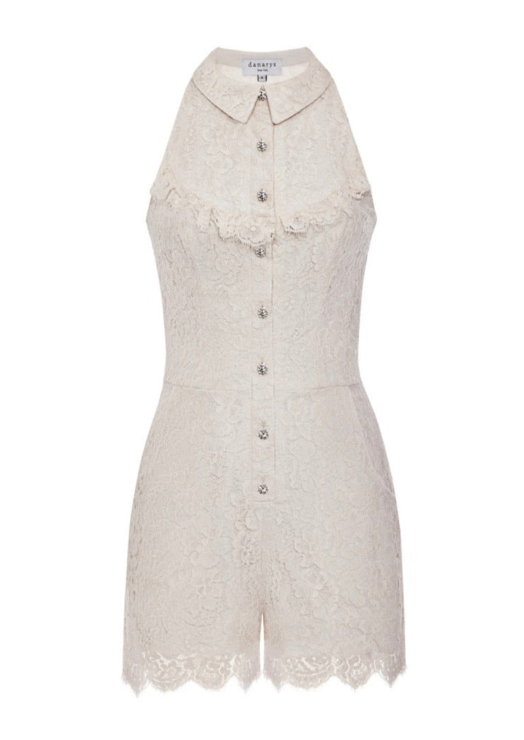 Front view of The Carlisle Romper showcasing its ivory color, collar, front bib, and crystal buttons on a white background