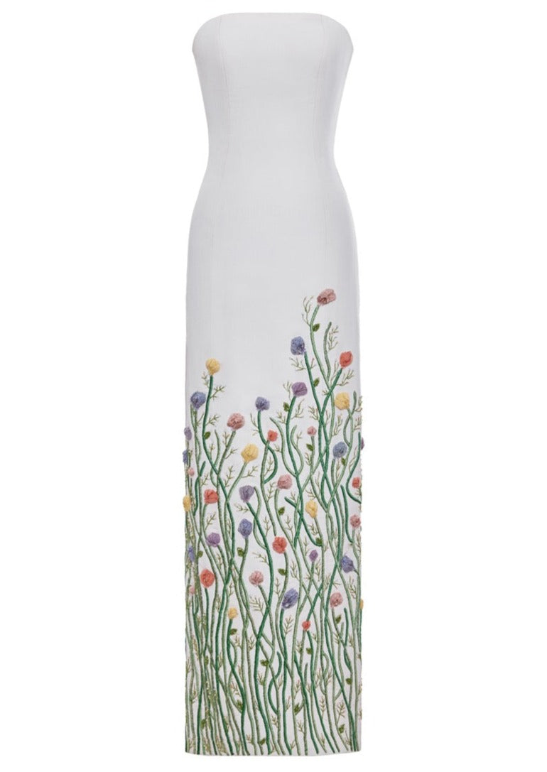 Front view of The Micaela Gown showcasing hand-embroidered floral tulip motifs on a white background