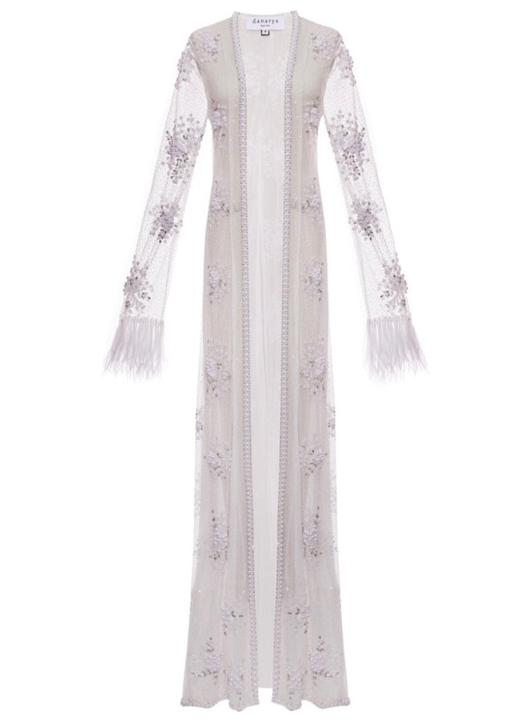Front view of the floor-length Nellie Duster showcasing pearl crystal motifs and ostrich feather cuffs on a white background